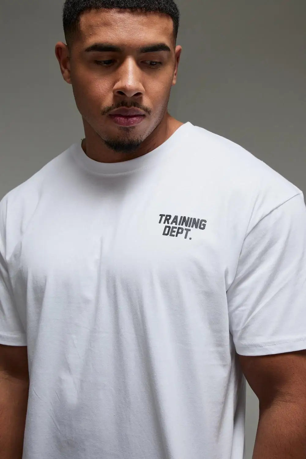 "training Dept." oversized T-shirt